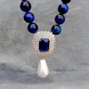 Choker Y.YING Blue Tiger Eye Collier Cubic Zirconia Pave White Shell Pearl Pendant pour femme