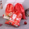 Emballage cadeau Père Noël Sacs à cordon Enfants Faveurs Sac à dos en tissu non tissé Anniversaire Événement Fête Fournitures Voyage Stockage Paquet