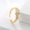 Anneaux de mariage acheter mode couleur or cuivre bijoux femme luxe CZ Zircon conception ouverte bague réglable en gros