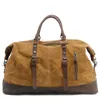 Sacs Duffel M013 toile imperméable en cuir hommes voyage bagage à main fourre-tout grand sac de week-end pendant la nuit