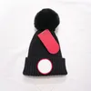 Kinderen pompon gebreide hoeden Canada brief mutsers jongens meisjes pom poms schedel doppen kinderen motorkap winter beanie ontwerper oormof 11colors