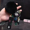 Sevimli ponpom anahtarlık moda kedi oyuncak ayı tasarımcısı anahtar zincir yüzüğü hediyeler kadın pu deri araba tokaları çanta cazibe aksesuarları erkek hayvan anahtarlık tutucu
