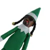 Com box verde roxo bisbilhoto roxo na varanda de bonecas elfas de Natal em um brinquedo dobrado, decora￧￵es de festas de festas de ano novo, festas de festas negras festas de bonecas de bonecas favoritos t1026ajpc