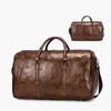 Duffelväskor Travel Bag Stor kapacitet Vattentät bagage Portabel Sport Weekend Business Duffle Soft Leather Resväska