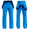 Skidåkning Bib Pants New Winter Thicken Warm Män Kvinnor Lovers Windproof Waterproof Suspender Snowboard Trousers L221025