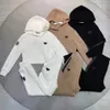 Kvinnliga spårningsdräkter lyxiga mode lady hoodie sätter avslappnade två stycken sätter svart vit kaki långärmad sportkläder tränande övning