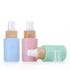 30ml 1oz Glass Essential oil perfume Bottles with colorful coated Refillable Bamboo Pump Sprayer bottle Portable cosmetic packaging containers