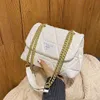 Handväska kedja kvinnors koreanska version fast färg mjuk läder rombisk gitter broderad tråd messenger singel fabrik grossist 70% rabatt