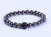 Charm Armband 5st Simple Style 8mm Black Hematite Stone Pärlor med Skull Pave CZ Charms Armband för män Titta på tillbehörsläpp