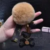 Keychains de pompom de pompom moda gato de pelúcia de ursinho de ursinho de ursinho de ursinho de ursinho de urso