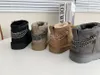 Nya f￥rskinn Snow Boot Mini Chain Boots Kvinnliga vinterskor Australien Plysch Varma ankelst￶vlar Kort sko