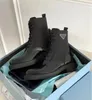 2022 Autumn beroemde wintermerken Geborsteld Leather REYlon Ankle Boots Zwart gerecycled geëmailleerde metalen driehoek gevechtslaars dikke lug sole platform laarsjes