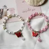 Strand Handsmycken Populära flerfärgade fjäril Opal armband Kvinnlig Fresh Girl Heart Pärled Hand