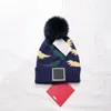 Bambini Dinosauro Cappelli lavorati a maglia Lettera di moda Pompon Berretti Ragazzi Ragazze Pom Pom Cappellini con teschio Cofano per bambini CANADA Designer Maglieria B1451872