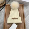 Pompoms winter hoed vrouwen gebreide hoed warme zachte trendy hoeden mode veer beanie gebreide motorkap dames oorbevolking bescherm ball fleece skiganie