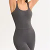 Aktiva upps￤ttningar Sommarkl￤der andas ryggl￶s stretchig sportkl￤der kostym kvinnlig antenn yogastr￶mma med br￶stkudd persika h￶ft jumpsuit