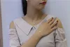 Nuevo diseño de moda, collar con colgante de adicción al movimiento de circón cúbico para mujer, joyería de una piedra de plata de ley 925 para mujer