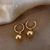 Goldene Farbe Metal Ball Pendell Ohrringe Viel Glück Einfacher Design Schmuck für Frauenmodische Mädchen empfindliche Ohrhörerzubehör