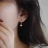 Goldene Farbe Metal Ball Pendell Ohrringe Viel Glück Einfacher Design Schmuck für Frauenmodische Mädchen empfindliche Ohrhörerzubehör