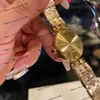Reloj de mujer de alta calidad Esfera blanca de 27 mm Bisel de diamantes de lujo Correa de acero inoxidable Reloj de pulsera de oro de moda Relojes de plata Reloj de cristal de zafiro imagen física