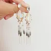 Dangle lustre à la main fleur noir cristal gland boucles d'oreilles 2022 nouvelle mode femmes déclaration longue goutte boucles d'oreilles