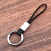 Keychains äkta läder Enkelt lanyard Keyring Men Women Car Key Holder Cover Auto Accessories Gifts