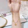 23ss 18k banhado a ouro colares de aço inoxidável gargantilha corrente carta bloqueio pingente declaração moda feminina colar jóias de casamento 1547064