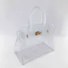 Nieuwe Tassen Straat Jelly Transparante Tas Laser Mirage Strandtas Pvc Draagbare Een Schouder Straddle Damestassen 220514