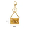 Creative Cute Mini Bag Key Chain Keyring med ornament Kvinnor Purse Car Pendant Gift PU l￤der liten handv￤ska