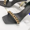 Uma Cain-Cain-Caining Oryginalny skórzany sandałowy moda sztylet pięta Pumki wieczorowe buty Kobiety luksusowe projektanci na wysokich obcasach