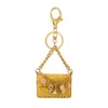 Creative Cute Mini Bag Key Chain Keyring med ornament Kvinnor Purse Car Pendant Gift PU l￤der liten handv￤ska