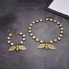 Set di gioielli di design Bracciali di moda Collane Collana di gioielli con ciondolo a forma di insetto con diamanti di lusso da donna Catene di gioielli placcati in oro da uomo