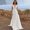 2023 Boho Chiffon Wedding Dress Sexig V-hals Cap Sleeve Bridal Gown A-Line Lace Appliques Vestidos de Novia for Women