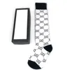 Bas de luxe Designer Hommes Femmes Chaussettes bas de laine rues seniors confortable genou jambe chaussette avec boîte