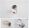 Solitaire Ring Rose Gold Rose Plated Oval Style com Sapphire Blue Element Crystal e Clear Round Round Cubic Zirconia Fashion Jewe Am7nm
