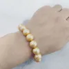 Süßwassergold Perlenarmbänder Strang 11-12 mm großer Runde 20 cm 22 cmcm lang modische und elegante Frauenschmuck Juwely für Hochzeitsfeiern geeignet