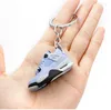 Keychains Lanyards Sneakers Keychain Trend Couple Bag Ornament 3D Stereo Mini Basketball Shoes Pendant Car Keyring Drop Delivery 2022 0B