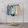 Iron display shelf Commercial Furniture with wheel horizontal bar clothing show racks floor mounted gold women's clothing store shelfs