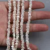 Łańcuchy naturalne wyciągnięte środkiem 4-5 mm luźne białe pasma Keshi Pearl