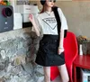 Gonna a-line a vita alta delle nuove donne di moda primavera/estate che dimagrisce il pannello esterno coreano casuale di personalità versatile della cinghia