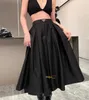 Saia de moda feminina combinando tendência de náilon triângulo invertido saias de designer de alta qualidade vestidos femininos preto cor tamanho S-L