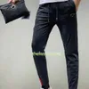 Pantaloni sportivi da uomo a figura intera con lettere Taglia Sport Active Style Bottoms Pantaloni lunghi neri e grigi taglia M-3XL