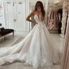 Abiti da sposa da sogno a-line Abiti da sposa Boho con scollo a V applicati in pizzo Cinghie Abito da principessa in tulle da spiaggia Abito lungo