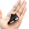 Klapetyki Lanyards 3D Mini Basketball Buty AJ Trzy Nsional Bierek Gwiazdy Sneakers Wiselan Personality Creative Bag Small Drop Smtpx