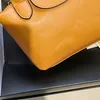 2023 Neue Mini -Knödel -Tasche Schaffell Handtasche Einfacher Mode ein Schulter schräg Straddle Damen's Cosmetic