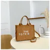 Marc Tote Bag Womens Designer Bag عملي كبير السعة الرفاهية حقيبة يد متنوعة متسوقين عبر الجسم حقائب اليد المصممين محفظة محفظة مربع 221014