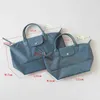 Bolsos de noche bolsos de hombro de alta calidad tela gruesa de moda bolso de moda mensajero de bolso de mando de bolso de mando de cuero para mujer 220623