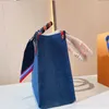 Handväska designer Bagsingle Quality Mommy Bag Purse Stor denim Craft Shopping Väskor Kvinnor Lettertryck Tote Handväska Långa axelband