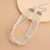 Ras du cou Style français blanc Imitation perle multicouche collier tempérament rétro élégant perles faites à la main chaîne courte dames bijoux