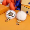 طبعة محدودة للجنسين مفتاح محفظة Sunflower Ski Doll Fur -keychain العلامة التجارية الفاخرة للنساء رجال حقائب حقيبة قلادة إكسسوارات مفاتيح DES290V